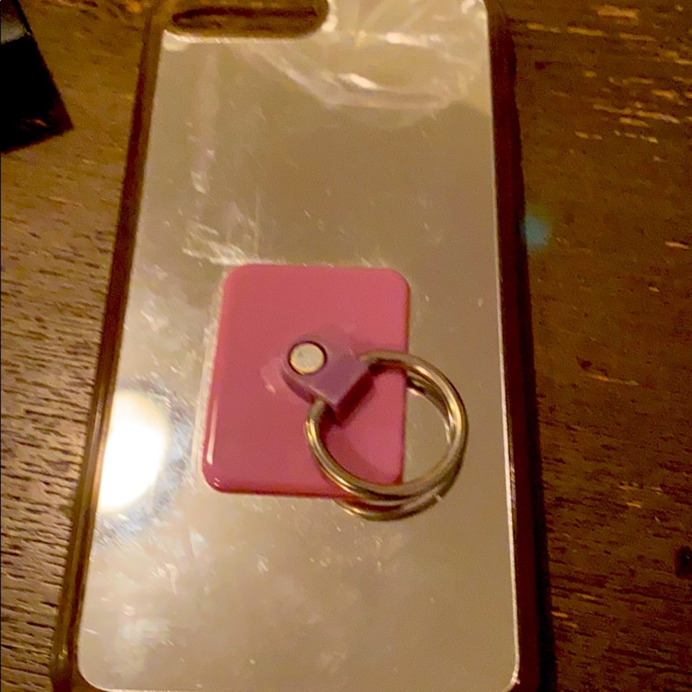 iPhone case mirrored with holding tag